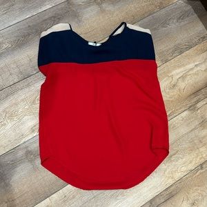 Red, blue and tan blouse. Short sleeved. Size large. Smoke free home.